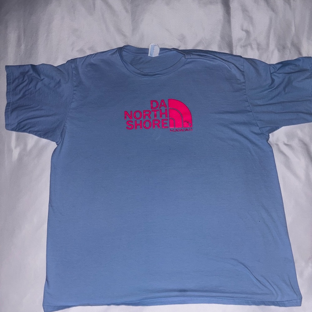 Da North Shore Hawaiian Casual Blue Tee with Pink Logo. (Not North Face)